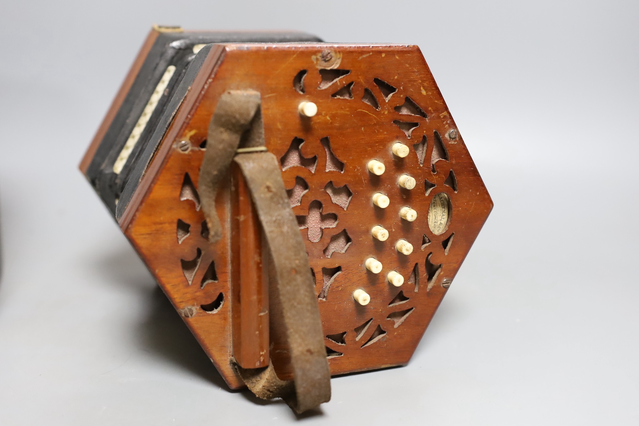 A cased Lachanel & co. 21 button concertina, 106301 - box is 18cm high